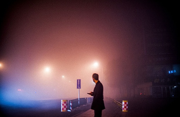 Peking zahalen ve smogu